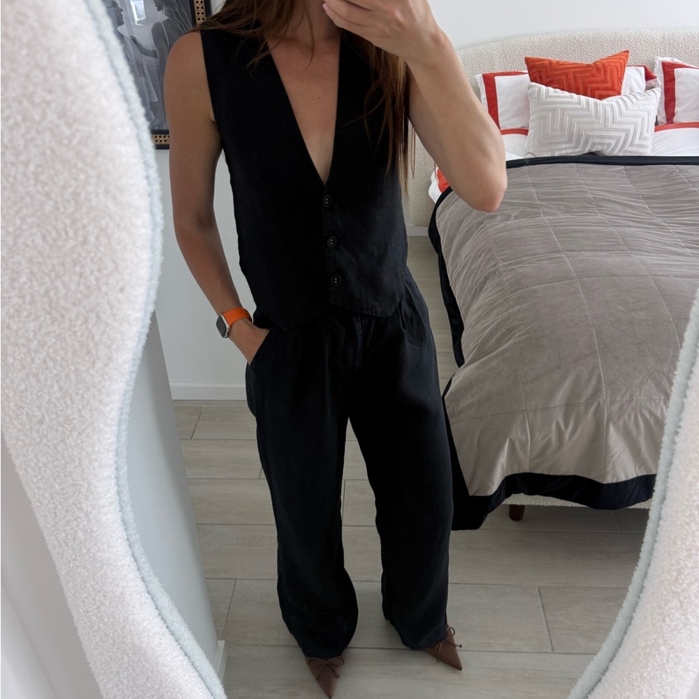 DISSH Black Sleeveless V-Neck Button Front Jumpsuit